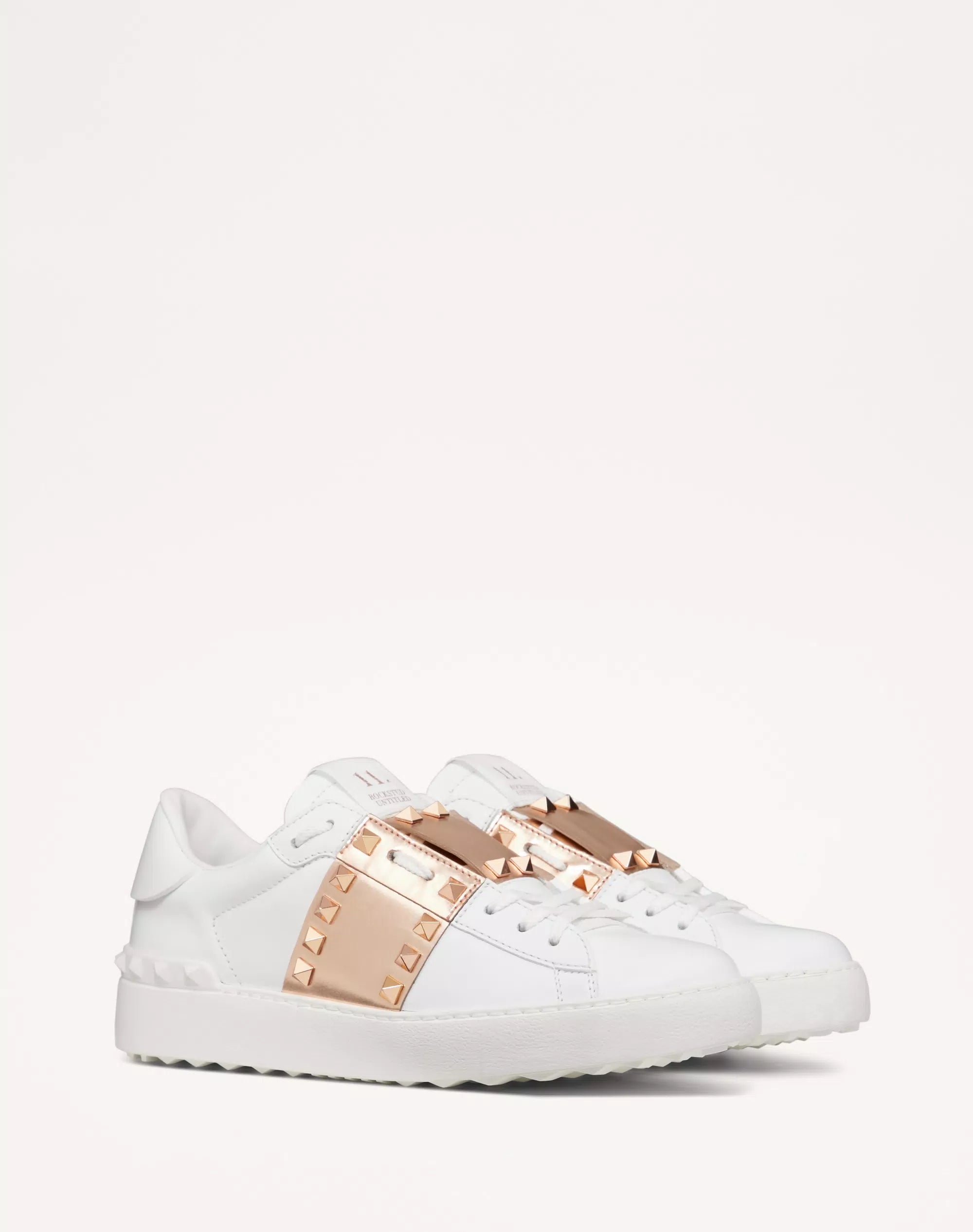 Valentino Garavani Rockstud Untitled sneaker in White/Gold calfskin leather