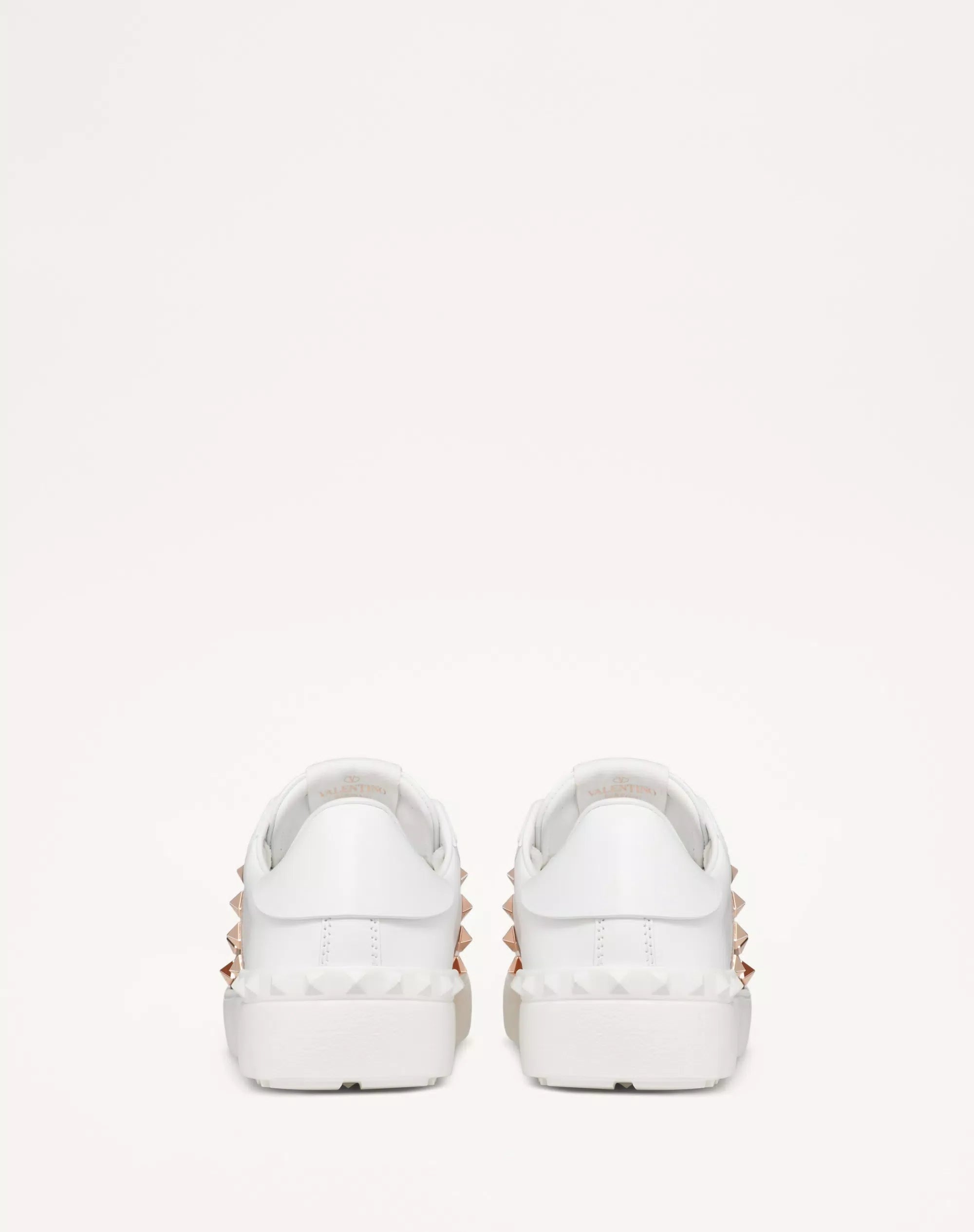 Valentino Garavani Rockstud Untitled sneaker in White/Gold calfskin leather