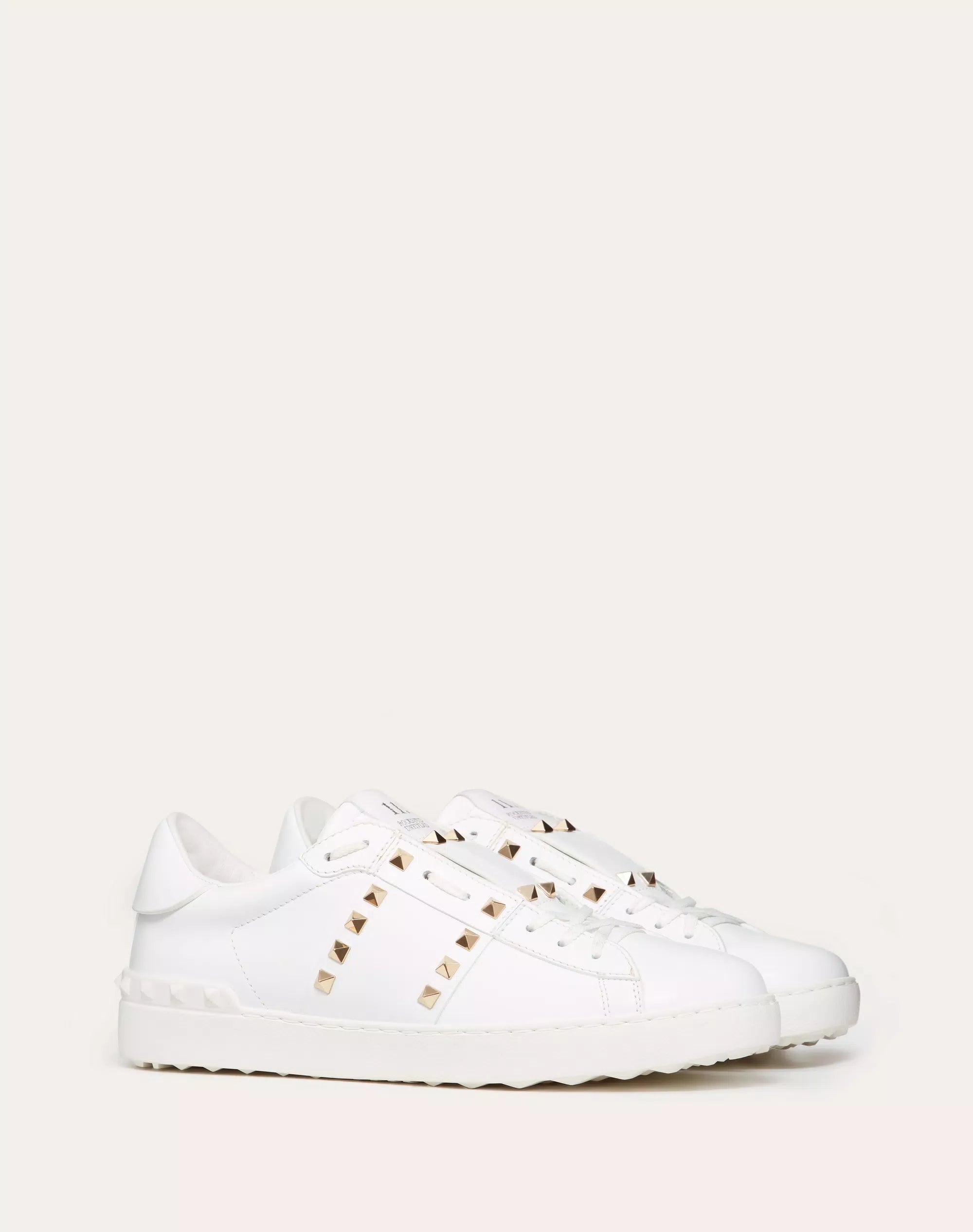 Valentino Garavani Rockstud Untitled white calfskin sneaker.