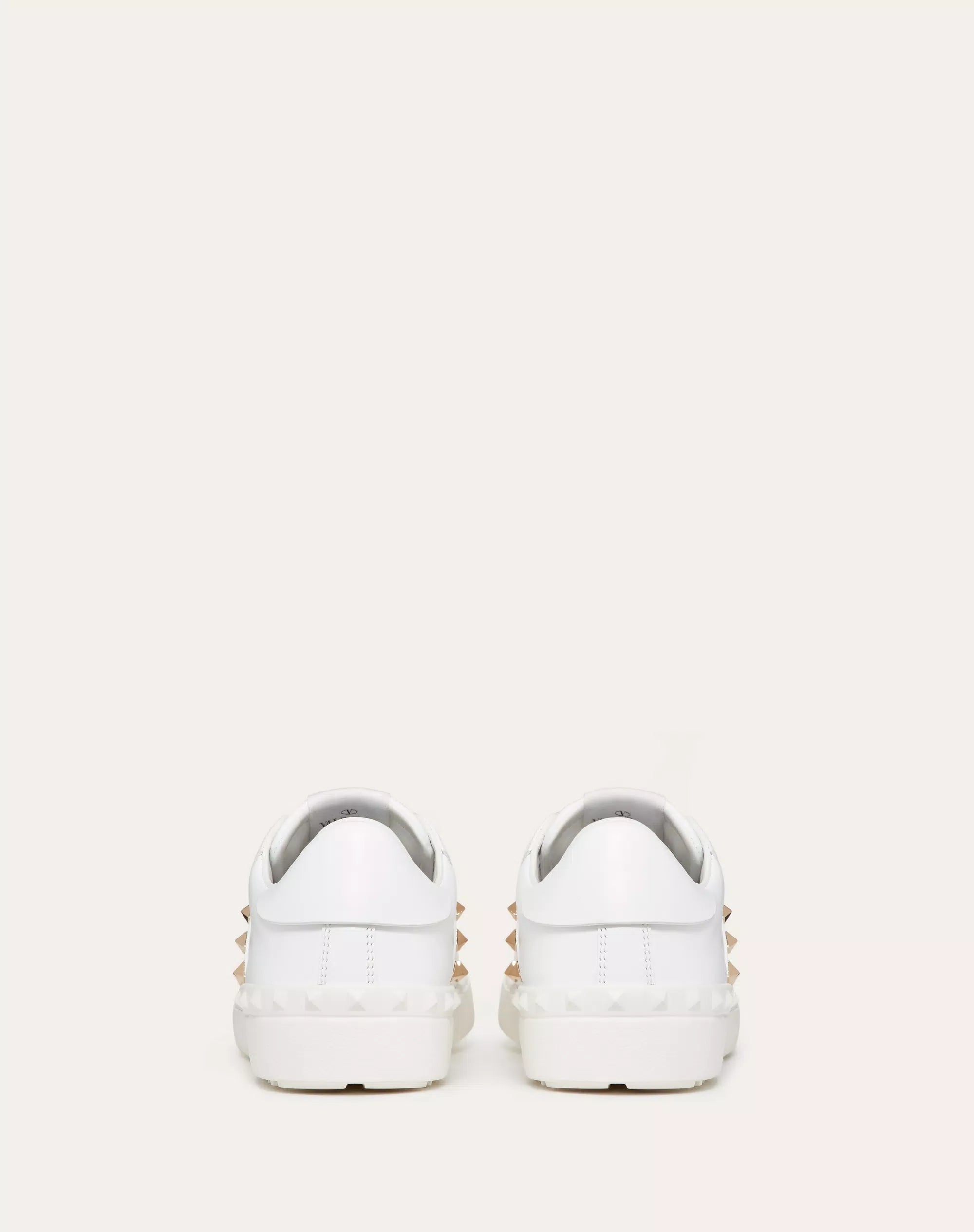 Valentino Garavani Rockstud Untitled white calfskin sneaker.