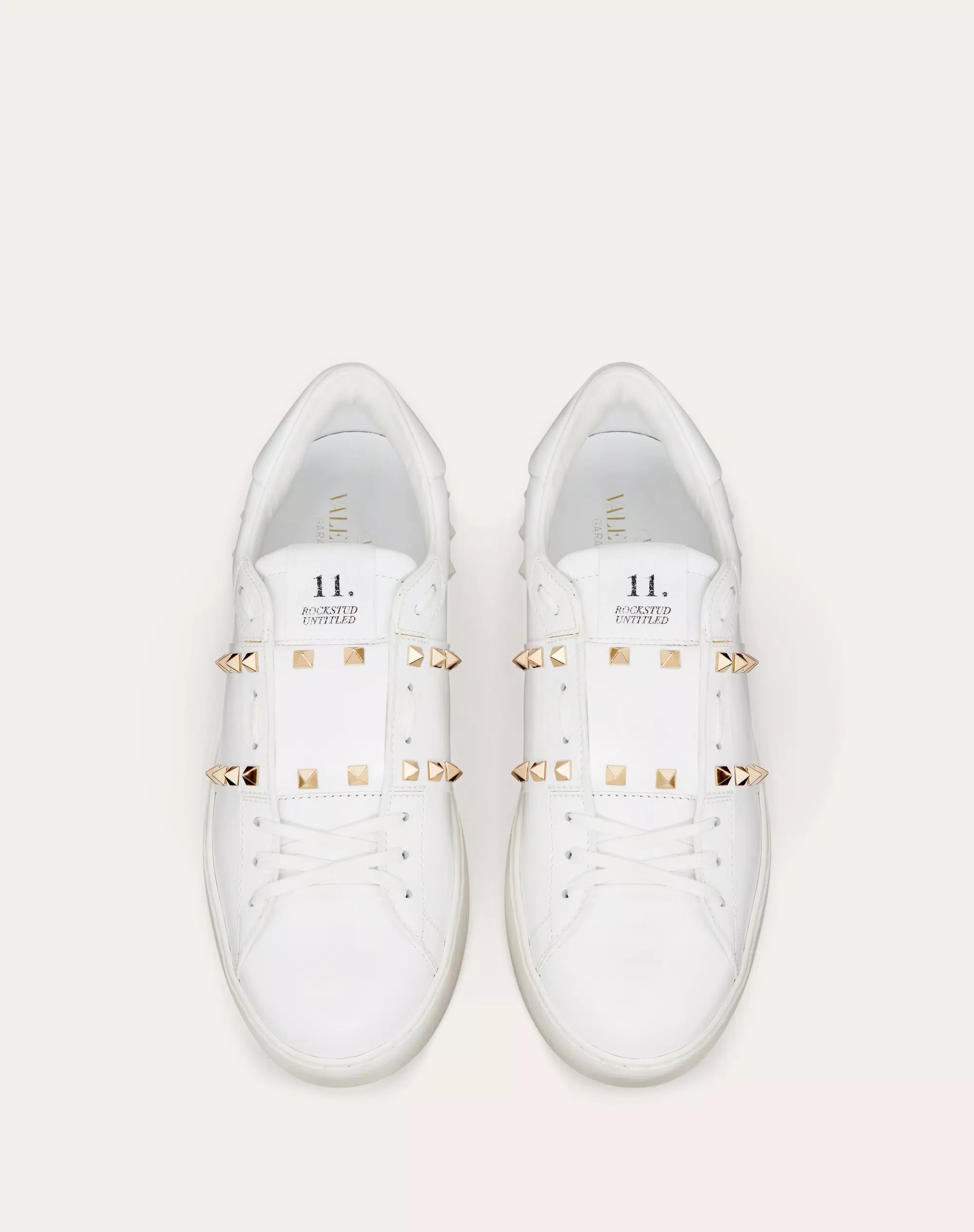 Valentino Garavani Rockstud Untitled white calfskin sneaker.