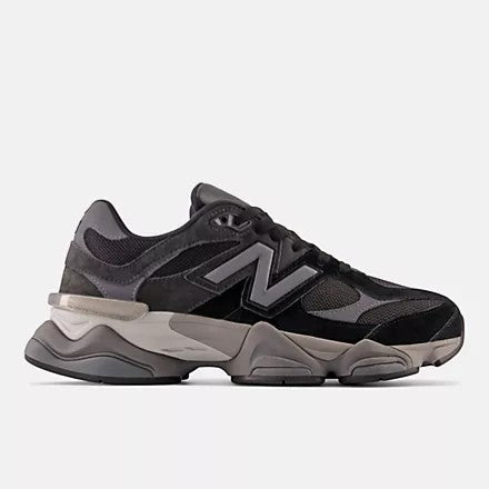 Aurore New Balance 9060 sneakers in black, castlerock, and rain cloud grey with suede and mesh details.