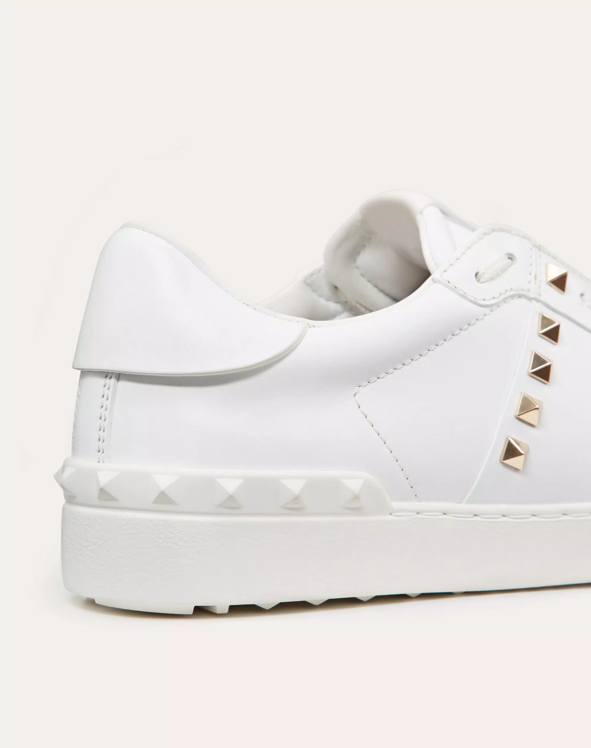 Valentino Garavani Rockstud Untitled white calfskin sneaker.