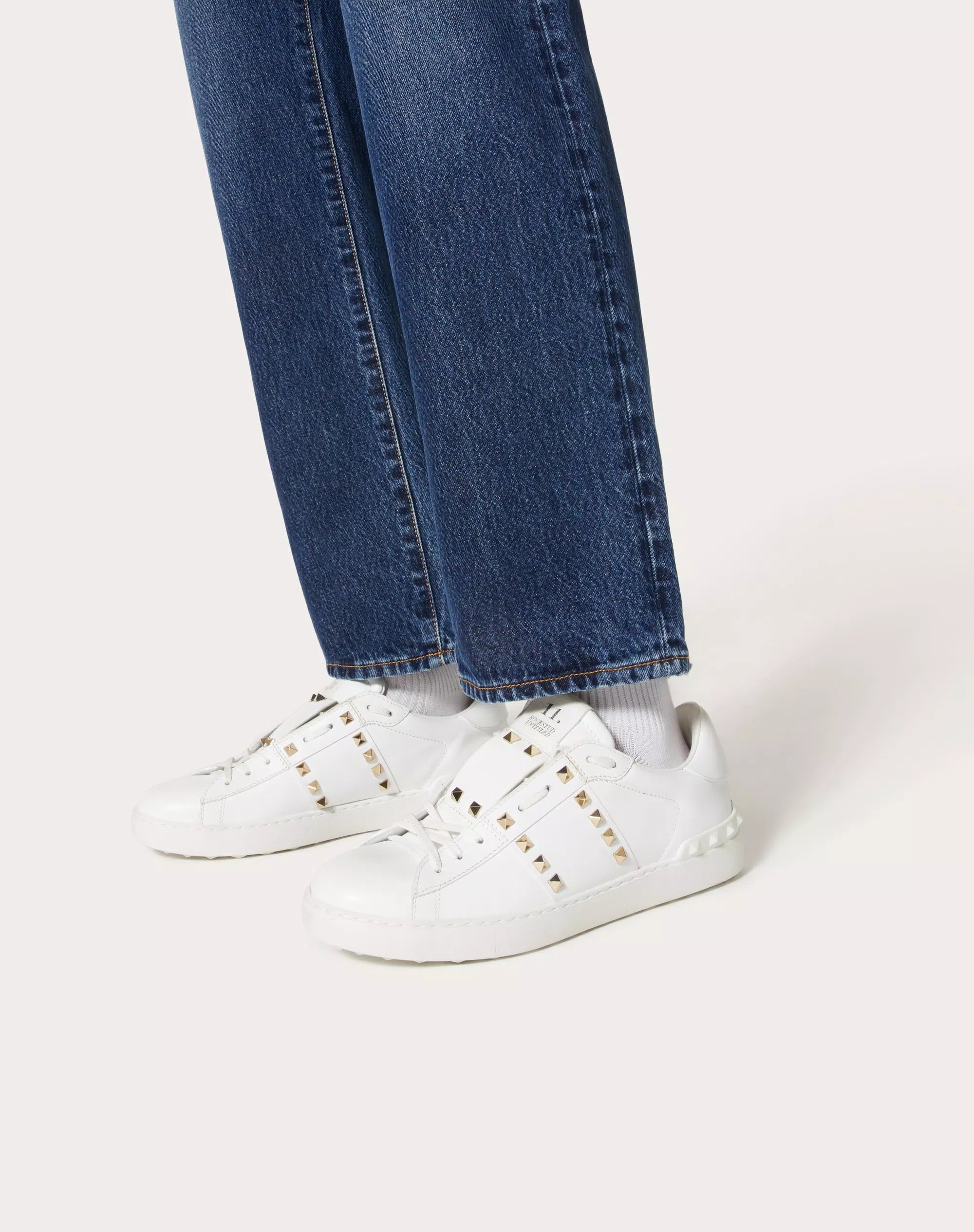Valentino Garavani Rockstud Untitled white calfskin sneaker.