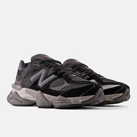 Aurore New Balance 9060 sneakers in black, castlerock, and rain cloud grey with suede and mesh details.